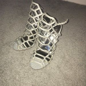 Silver high heels , size 6